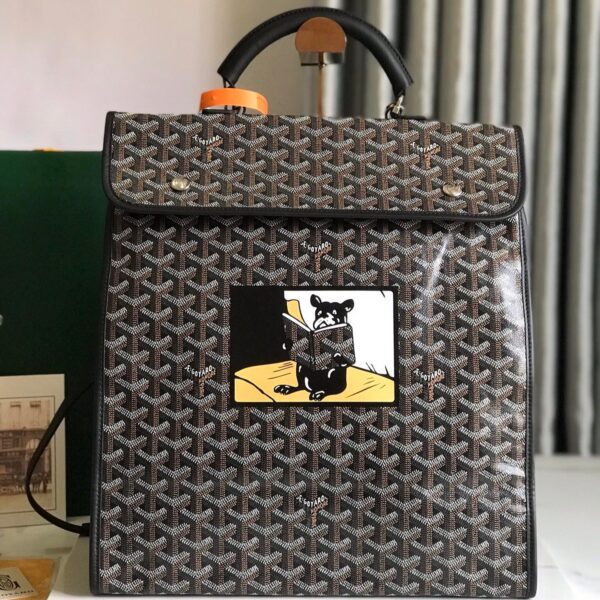 SAINT LGER BACKPACK 35 IN BROWN MIX BALCK GOYARDINE CANVAS AND CALFSKIN WITH CARTOON PATCH